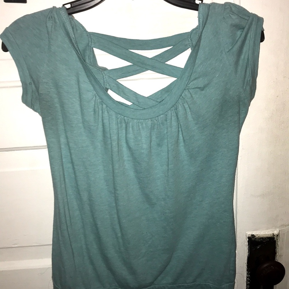 A Shirt With Open Stripes At The Back